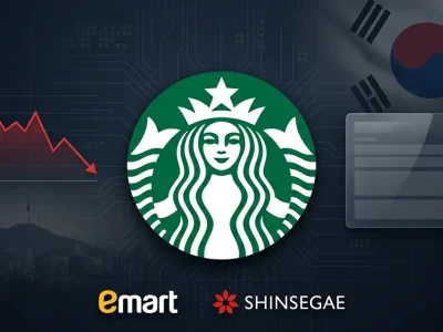 Starbucks green siren logo flanked by E-Mart and Shinsegae brand marks, a downward sales line graph, and a dim Seoul skyline on a dark navy background